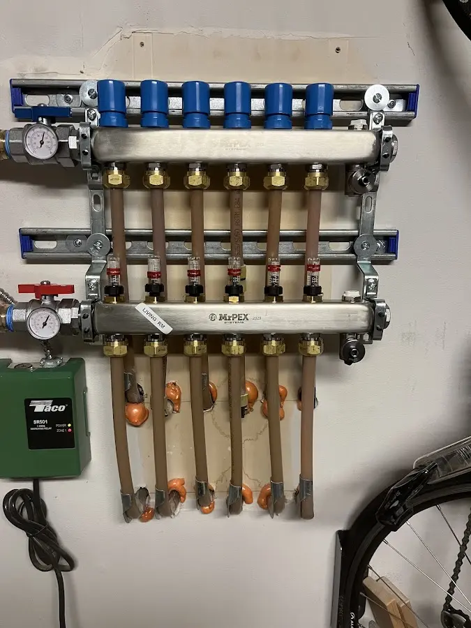 Plumber performing Water Heater Repair at a residential property in Fox Farm-College